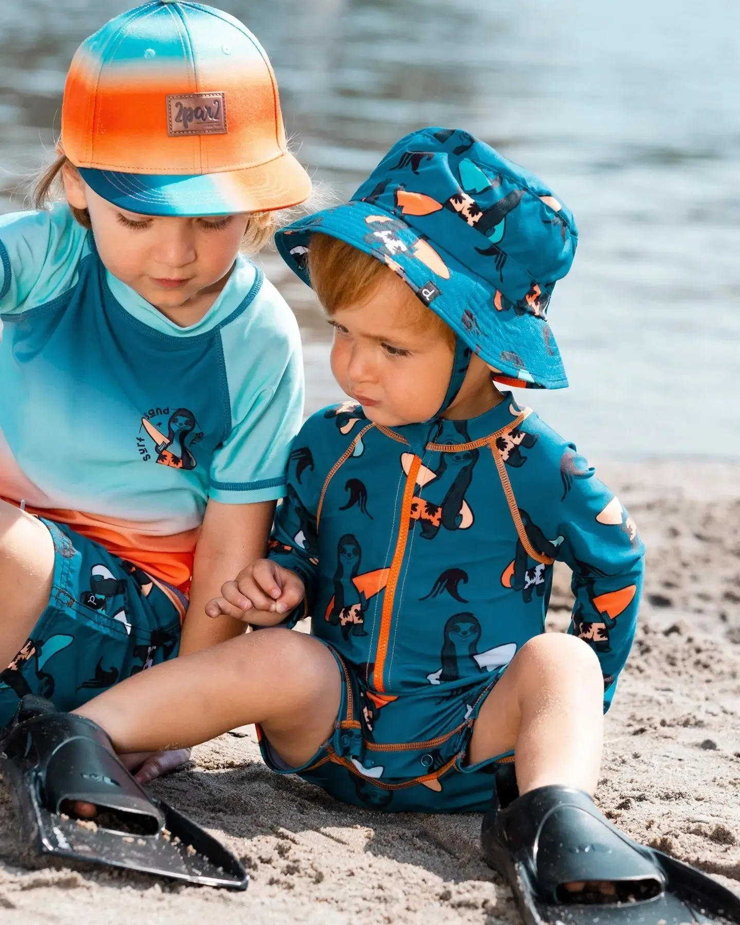 Printed Long Sleeve One-Piece Rashguard Orange Sloths On Navy Blue